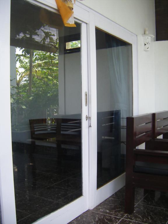 Alur Beach Homestay Амед Номер фото