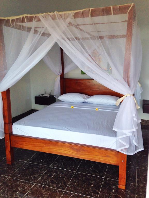Alur Beach Homestay Амед Номер фото