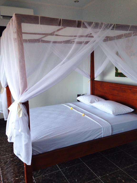 Alur Beach Homestay Амед Номер фото